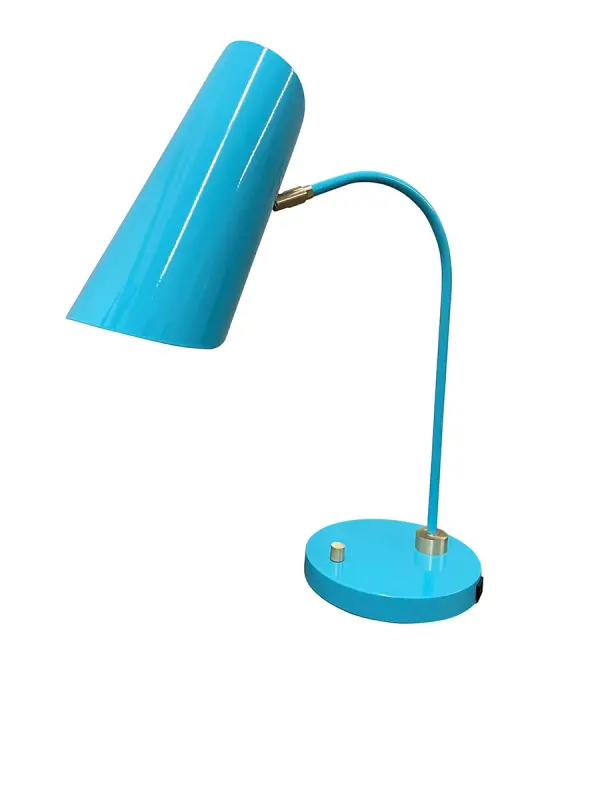 The Logan table lamp combines azure blue and satin brass finishes for a sophisticated two-tone look. Features a full-range dimmer and integrated USB charging port, making it ideal for modern workspaces and bedrooms.