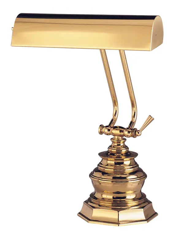 This elegant 10-inch polished brass lamp combines traditional styling with practical task lighting. Ideal for illuminating piano keys or desk surfaces with its adjustable shade and warm metallic finish.