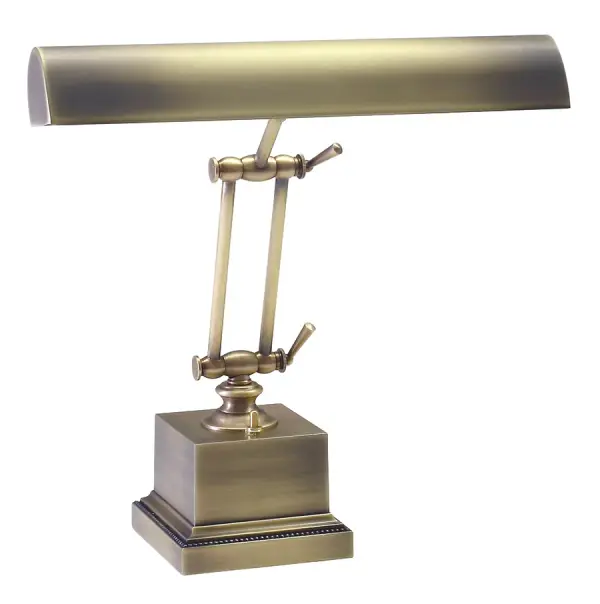 This 14-inch piano and desk lamp combines traditional styling with practical dual-bulb illumination. The antique brass finish adds warmth and sophistication to any workspace or piano area.