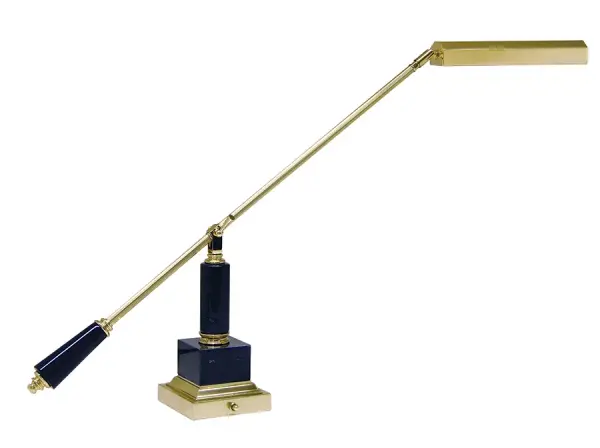 This sophisticated counter-balanced lamp combines traditional polished brass with a substantial black marble base, offering adjustable task lighting ideal for pianos, desks, and reading areas.
