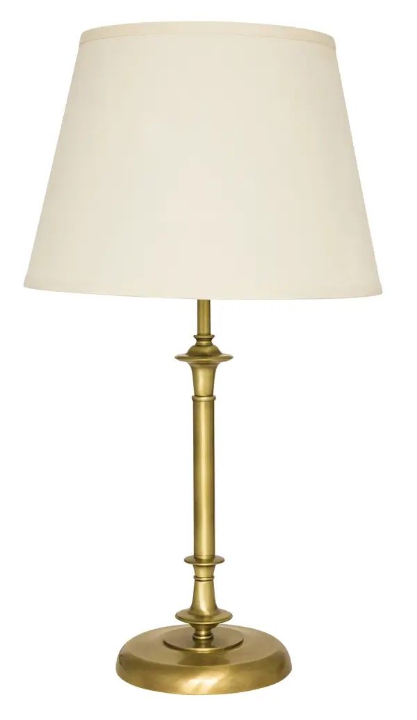 The Randolph table lamp combines traditional styling with versatile antique brass finish. At 29" tall with a generous 16" linen shade, it provides substantial presence and warm ambient lighting for living spaces and bedrooms.