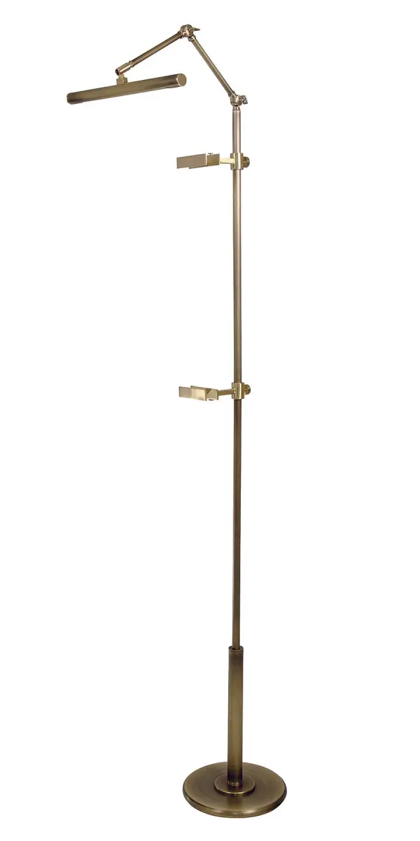 The River North Easel Floor Lamp combines functional task lighting with elegant design. Its adjustable easel-style arm and integrated LED provide focused illumination, while the mixed brass finishes add warmth and sophistication to any space.