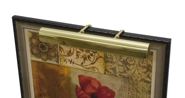 A traditional 24-inch picture light in polished brass finish, designed to highlight artwork and wall décor. Features three candelabra-base bulbs for warm, even illumination. Plug-in design offers easy installation without hardwiring.