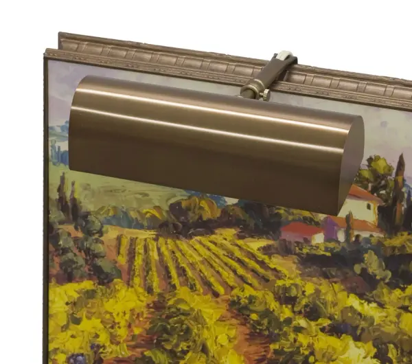 A traditional 8-inch picture light in statuary bronze finish, designed to highlight artwork and framed pieces. Plug-in convenience with California Title 24 compliance makes it practical for residential and light commercial use.