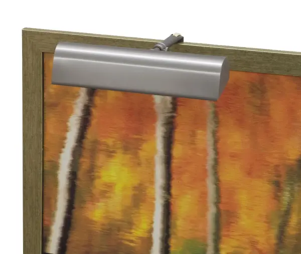 A compact 9-inch traditional picture light in pewter finish, designed to highlight artwork and framed pieces. Plug-in convenience with California Title 24 compliance makes installation straightforward.
