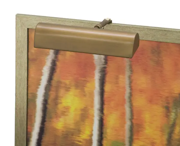 A traditional 9-inch picture light in weathered brass finish that provides focused illumination for artwork and wall displays. Plug-in design offers easy installation without hardwiring. California compliant.