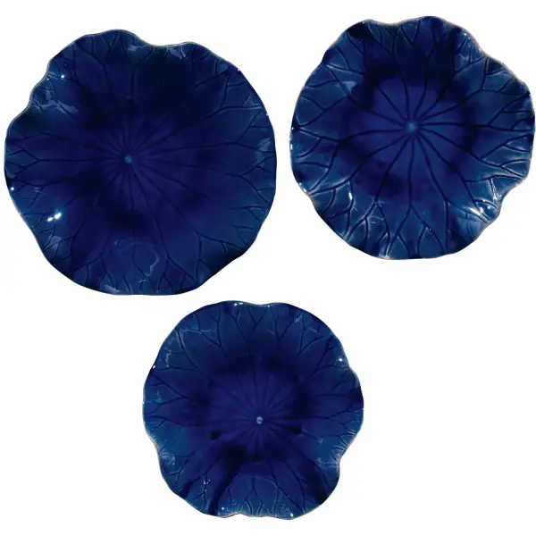 A set of three veined ceramic flowers glazed in vivid cobalt blue, versatile enough for indoor walls, tabletops, or covered outdoor spaces.