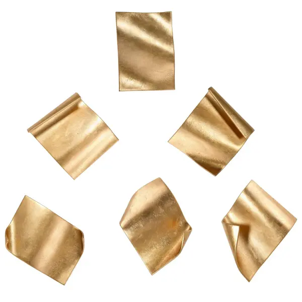 A set of six iron wall pieces finished in distressed bright gold leaf, shaped like fluttering pages. Versatile for creative gallery-style wall arrangements.