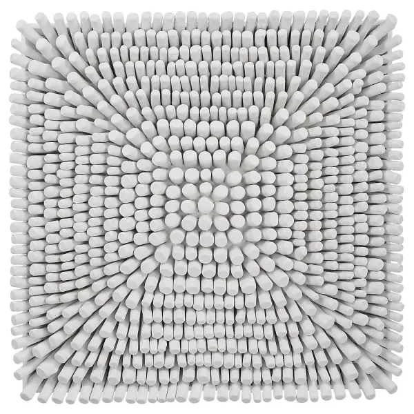 A simple beech wood wall panel in a matte white finish that brings a casual coastal feel to any wall arrangement.