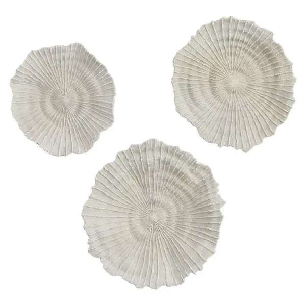 Handcrafted polyresin wall disc mimicking sea coral texture, ideal for coastal-themed interiors or covered outdoor spaces.
