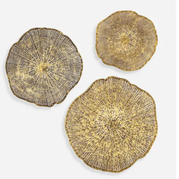 A set of three laser-cut metal flower wall decor pieces finished in gold with natural distressing, designed to be displayed together for dramatic dimensional impact.