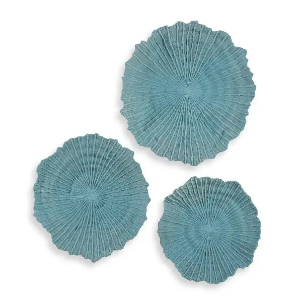 A set of three sculptural sea-coral-inspired wall pieces in vivid ocean blue polyresin, adding textured, beach-house charm to any room.
