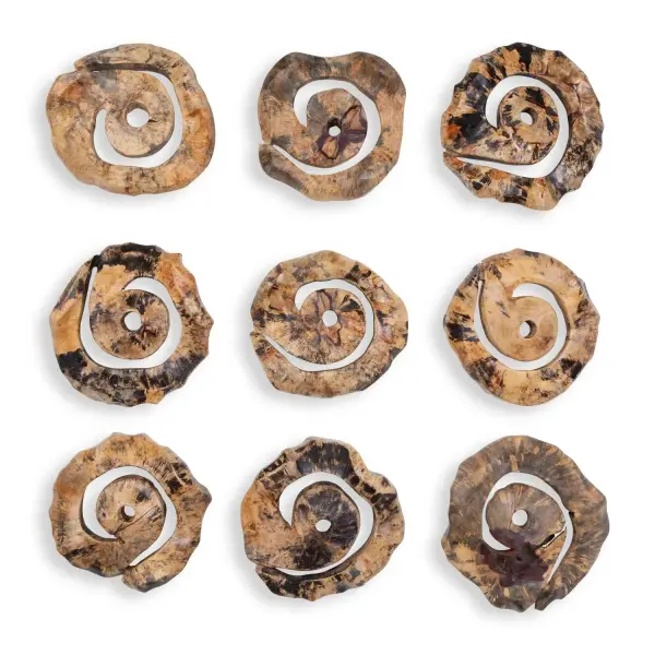 A set of nine handcrafted tamarind wood spirals with natural spalting adds sculptural, organic texture to walls in living spaces or lobbies.