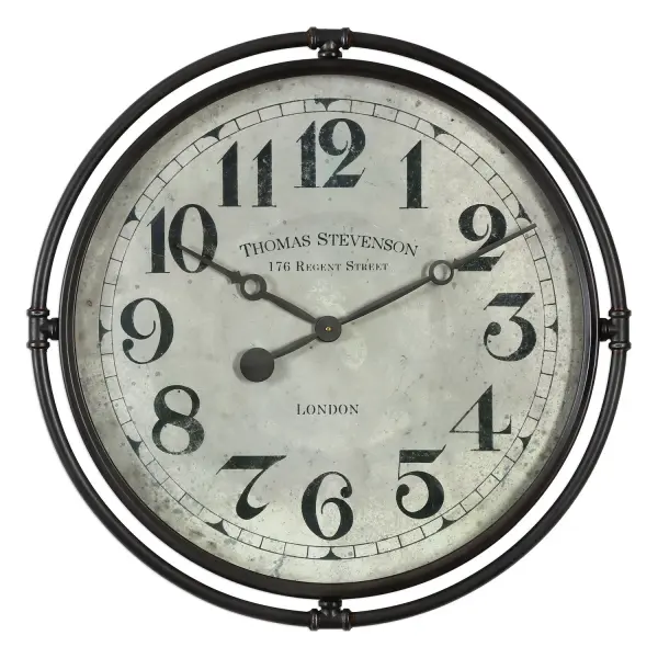 This 29.5" iron-framed wall clock pairs a smoke gray industrial frame with an aged ivory face under glass, ideal as an oversized accent piece.