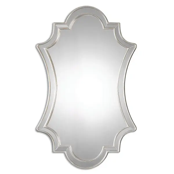 Gracefully Curved Polished Edged Mirror Facets Encased In A Lightly Antiqued Silver Leafed Frame. Collection: Elara Finish: Antiqued Silver Leafed Width: 27.00" Height: 43.00" Length: 1.13" Weight: 14.30 lb Extension from Wall: 1.13" Material: Pu/Mdf/Glass Country of Origin: Cambodia Safety Rating: Indoor Only