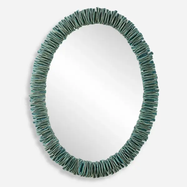 The Bonaire Oval Mirror Is A True Testament To Craftsmanship, Made From Carefully Folded And Layered Ceramic Disks. Each Piece Is A Unique Handcrafted Marvel, Finished In A Distressed Mottled Teal Blue Glaze. Due To The Nature Of Fired Glazes On Ceramics, Finishes Will Vary Slightly. Collection: Bonaire Designer: Renee Wightman Finish: Blue Glaze Width: 26.50" Height: 34.50" Length: 2.50" Weight: 26.50 lb Extension from Wall: 2.50" Material: Ceramic, Mirror, Resin, Metal, Mdf Country of Origin: China Safety Rating: Indoor Only
