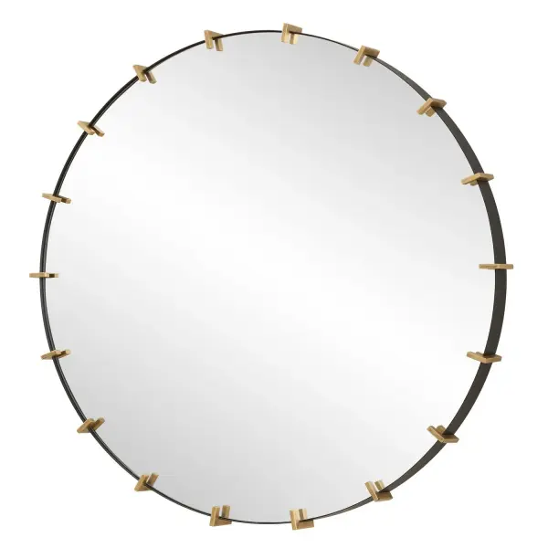 A striking round mirror blending industrial black iron strap framing with softly antiqued brushed gold details around a floating polished-edge mirror.