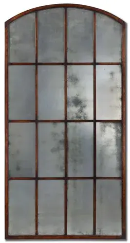 This Oversized Arch Features A Forged Iron Frame In A Hand Applied Warm Bronze Finish With Burnished Distressing Encasing An Antique Style Mirror. Collection: Amiel Designer: Grace Feyock Finish: Maple Brown Notes: Hand forged metal frame finished in heavy maple wash with gold highlights and burnished details. Width: 42.25" Height: 82.00" Length: 1.50" Weight: 89.00 lb Extension from Wall: 1.50" Material: Metal, Glass, Mdf Country of Origin: China Safety Rating: Indoor Only