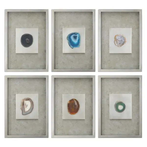 Silver leaf shadow boxes with mottled silver champagne backgrounds showcase colorful natural agate slabs under glass — a striking accent for walls large or small.