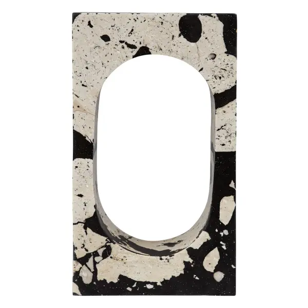 A handcrafted stone-and-resin sculpture with bold, clean lines inspired by modern art. Works indoors or out, though it should avoid freezing temps.