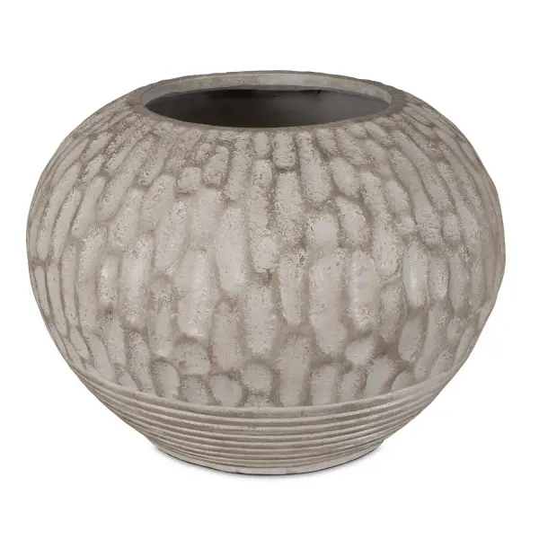 Elevate Your Plant Game With Our Terracotta Planter, Featuring Elegant Carvings And A Unique Ribbed Base. All Finished In A Lightly Antiqued White Wash With Light Brown Undertones. Perfect Addition To Any Indoor Space. Collection: Rustic Roots Designer: Osvaldo Mendoza Finish: Terracotta Width: 18.00" Height: 13.50" Length: 18.00" Weight: 21.27 lb Material: GRC Country of Origin: Indonesia Safety Rating: Indoor Only