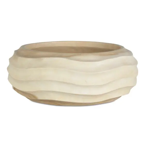 Handcrafted from bleached suar wood, this wave-carved bowl adds organic texture and understated sophistication to tabletops and shelves.