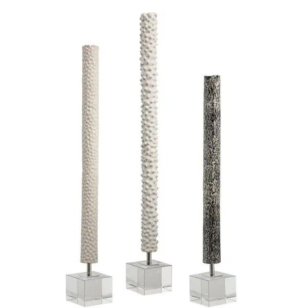 This set of three ceramic sculptures brings a black-and-white color story accented with polished chrome and crystal for an eclectic, curated look.