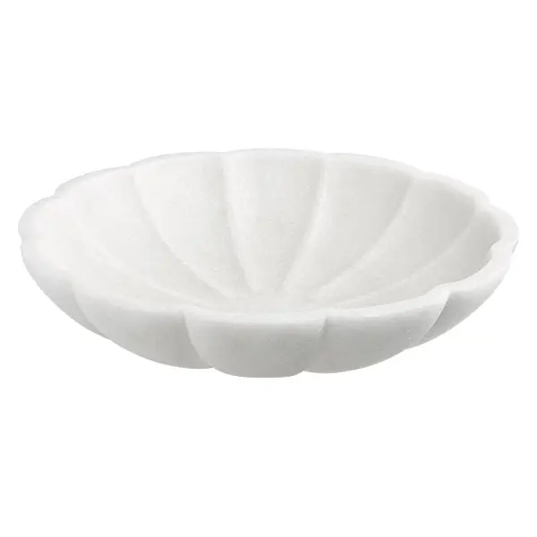 An elegant multipurpose bowl in ivory ricestone with a convincing marble-like look, versatile enough for indoor tabletops or covered outdoor settings.