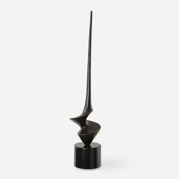 This cast iron tabletop sculpture pairs an aged bronze finish with a black marble base, adding sculptural interest to shelves, consoles, or desks.