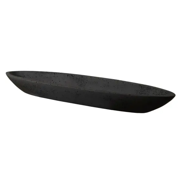 This elongated black stone-resin bowl brings an organic, sculptural accent to consoles and dining tables, blending decorative form with light functional use.