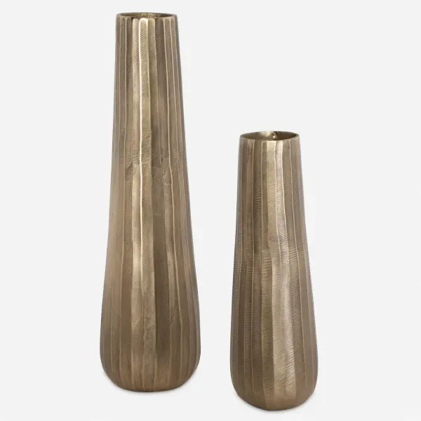 This textured cast aluminum vase set blends vintage charm with contemporary flair, offering a versatile decorative accent for tabletops, consoles, and mantels.