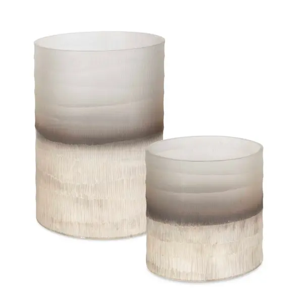 A set of two cylindrical glass vases with soft gradient tones and horizontal texture, versatile for florals or standalone display in contemporary interiors.
