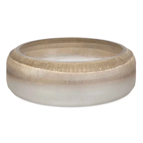 This glass bowl brings a soothing gradient finish and delicate textured lines to any tabletop, blending modern simplicity with an organic touch.