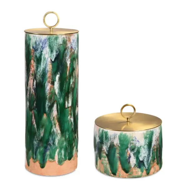 A set of two ceramic canisters with abstract green, pink, and white patterns and metal ring-knob lids—decorative storage with an artsy, preppy edge.