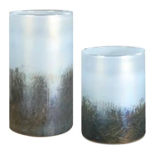 A striking set of two glass vases with a gradient from deep blue to silver, offering sleek, sophisticated decor for tabletops and shelves.