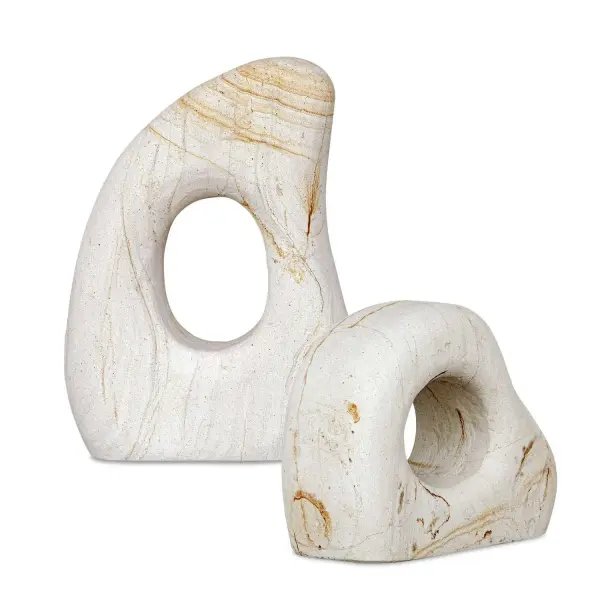 Hand-carved Palimanan stone sculpture with smooth, organic curves and natural grain variation. A grounding decorative accent for modern interiors or garden settings.