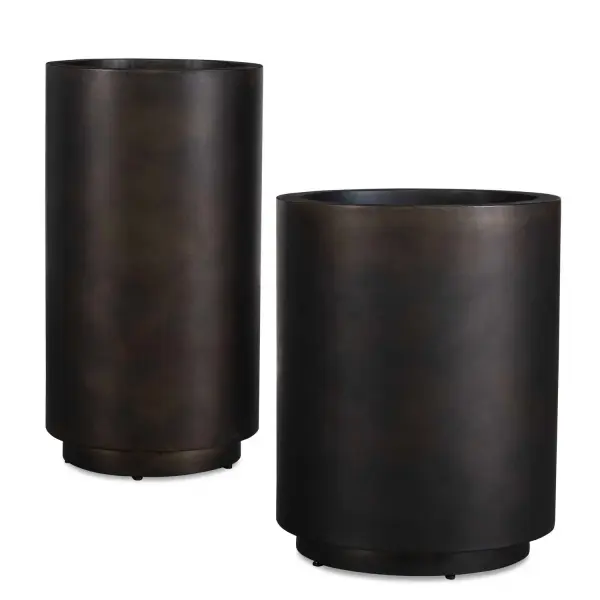 Elevate Your Space With The Sleek, Modern Iron Planters. Featuring A Minimalist Cylindrical Design And A Rich, Matte Bronze Finish. They Add A Bold Yet Sophisticated Touch To Any Setting. Safe For Outdoor Use. Sizes: S-16x20x16, L-12x22x12 Collection: Volcan Finish: Matte Bronze Width: 12.00" Height: 22.00" Length: 12.00" Weight: 28.60 lb Material: Iron Country of Origin: India Safety Rating: Indoor/Outdoor