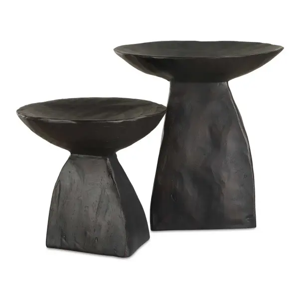 A set of two matte dark brown resin pedestal bowls with bold, organic forms—stylish decorative accents for shelves, consoles, or tabletops.