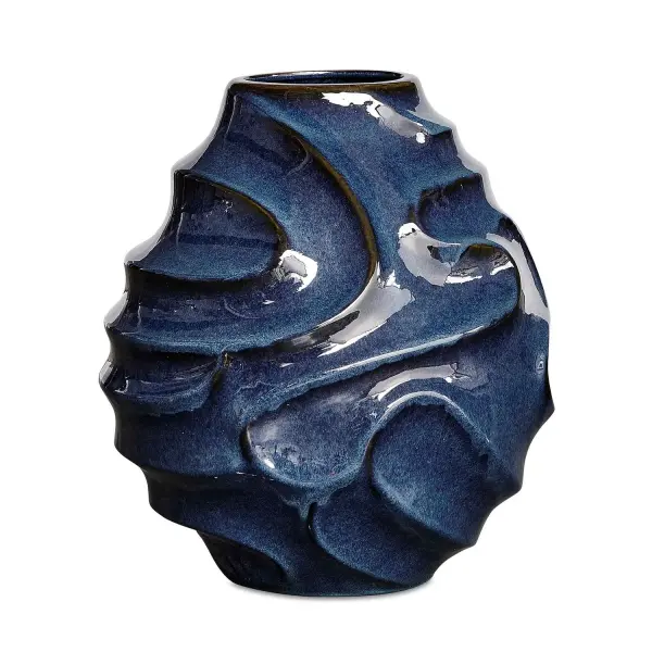 A bold ceramic accent piece with a deep glossy blue glaze and spiraling ridges, sized to make a statement indoors or on covered patios.