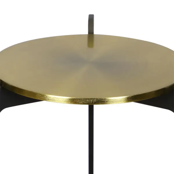 A striking pair of iron column candleholders in matte black with subtle antique brass accents. Includes two distressed white candles for an instant styled look.