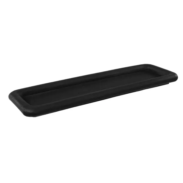 An elongated, minimalist tray in matte black rice stone with softly rounded edges, rated for indoor or outdoor use away from freezing temps.