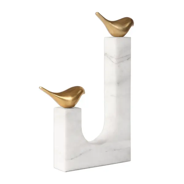 A refined tabletop sculpture pairing cast brass songbirds with a white marble base—an understated accent for shelves, consoles, or desks.