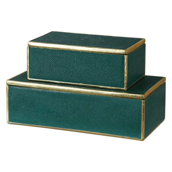 A decorative pair of emerald green polyresin boxes with bright gold leaf trim and removable lids, ideal for stylish tabletop storage and display.