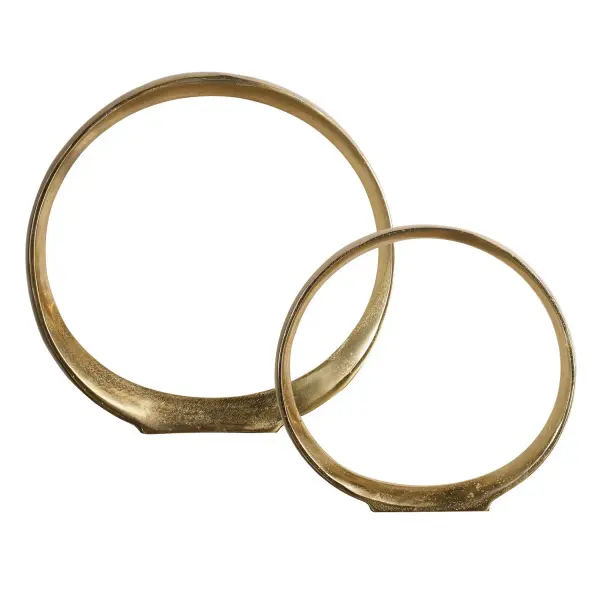 This aluminum tabletop sculpture set brings clean, contemporary curves in a warm gold finish, ideal for adding a refined accent to shelves or console tables.