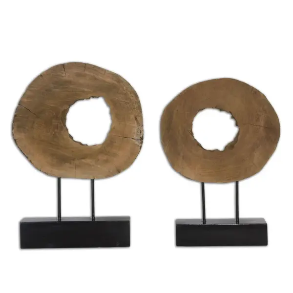 A set of two natural mango wood log sculptures on matte black iron bases, bringing organic texture and artisanal warmth to shelves or tabletops.