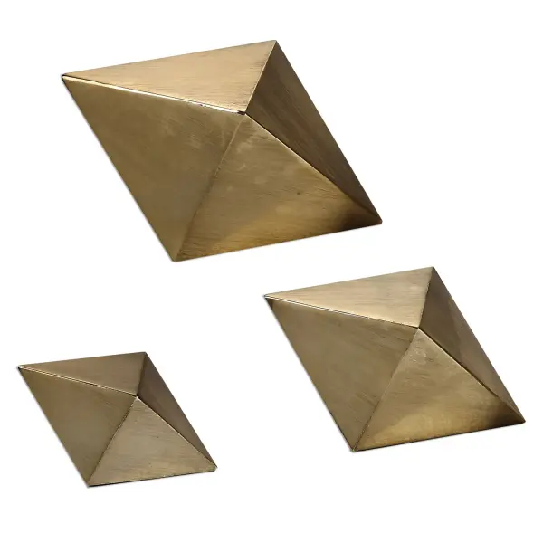 Decorative, Tabletop Accessories Feature A Heavily Antiqued Champagne Finish. Sizes: S-5x3x3, M-7x4x4, L-8x5x4 Collection: Rhombus Designer: David Frisch Finish: Antiqued Champagne Width: 8.25" Height: 5.00" Length: 4.25" Weight: 11.00 lb Bulb Type: tbn Material: Resin Country of Origin: China Safety Rating: Indoor Only