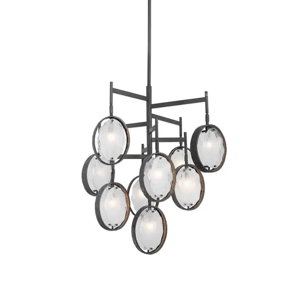 A nine-light ring chandelier in dark hammered bronze with handmade swirl glass ovals. Striking sculptural presence with adjustable installation for varied ceiling heights.