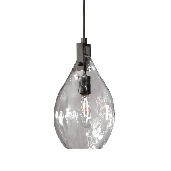 A compact transitional pendant pairing matte black metal with a flat teardrop glass shade—great for kitchen islands and small accent spots.