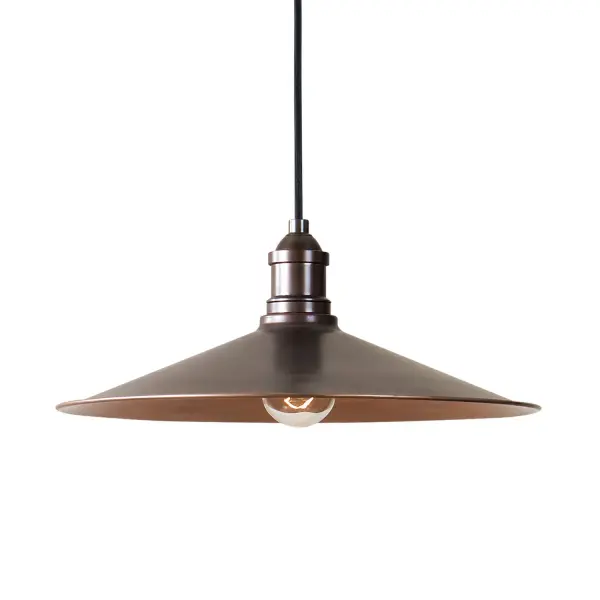 A compact single-light pendant with a warm antique copper finish and adjustable cord drop, well suited for small accent lighting needs.