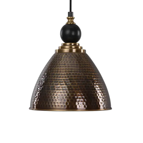 This single-bulb pendant pairs a hammered antique brass shade with a textured black accent ball, offering an adjustable 15-foot cord for flexible installation over small spaces.